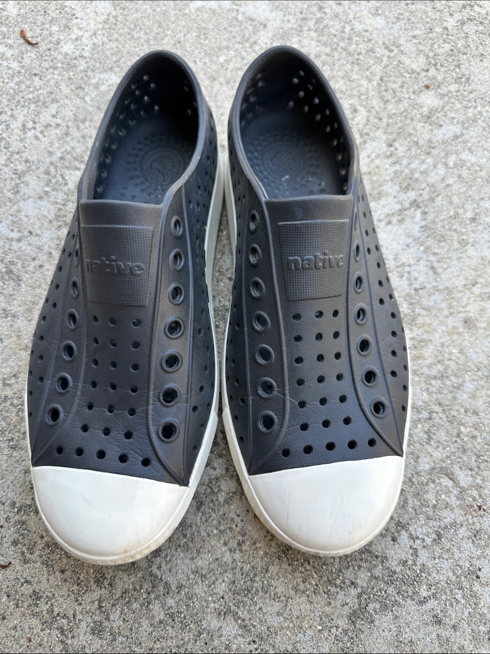 Native Women's Perforated Slip-On Loafers in Black with White Toe